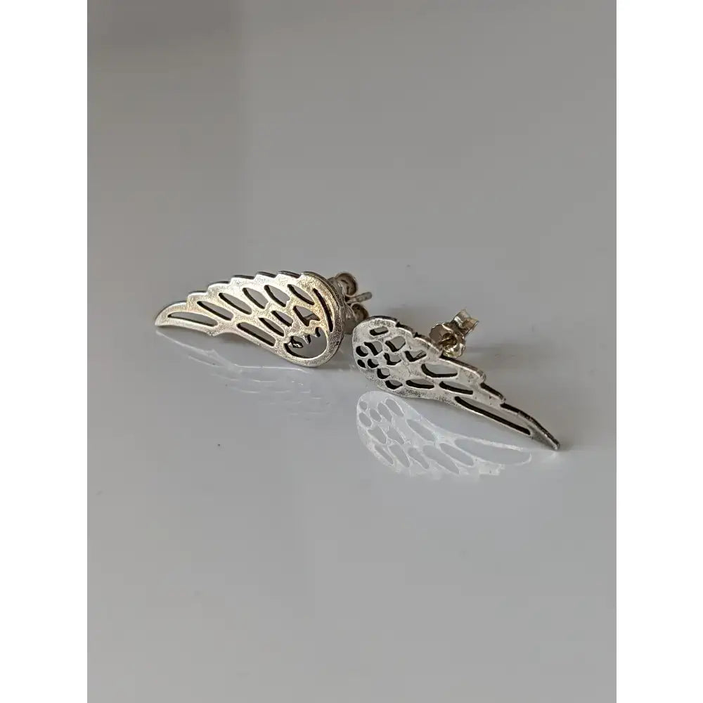 Silver steed angel wings stud earrings in silver with intricate cut-out detailing perfect as angel wings studs
