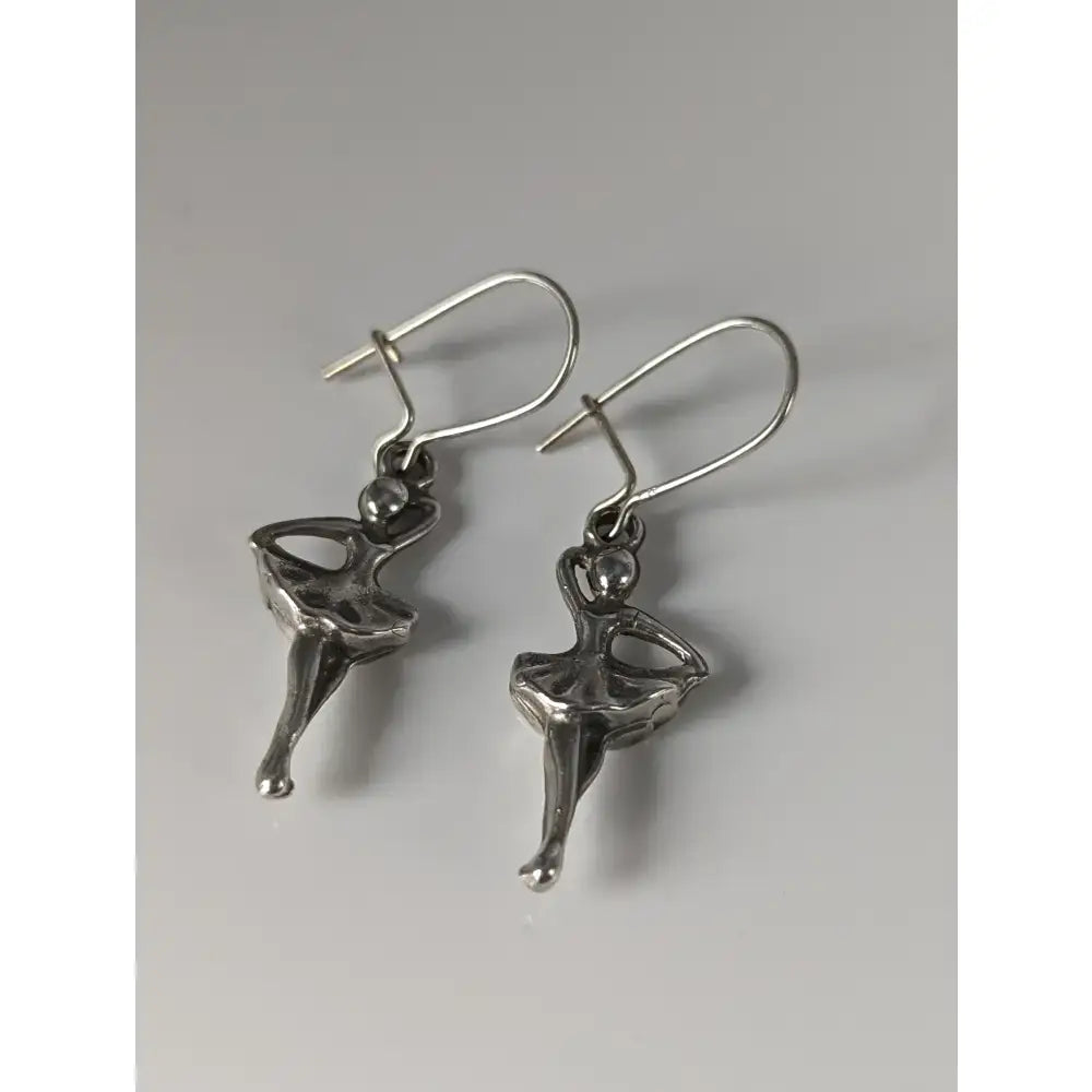 Silver steed ballet handmade silver earrings with polished finish and delicate articulated forth position dropped design