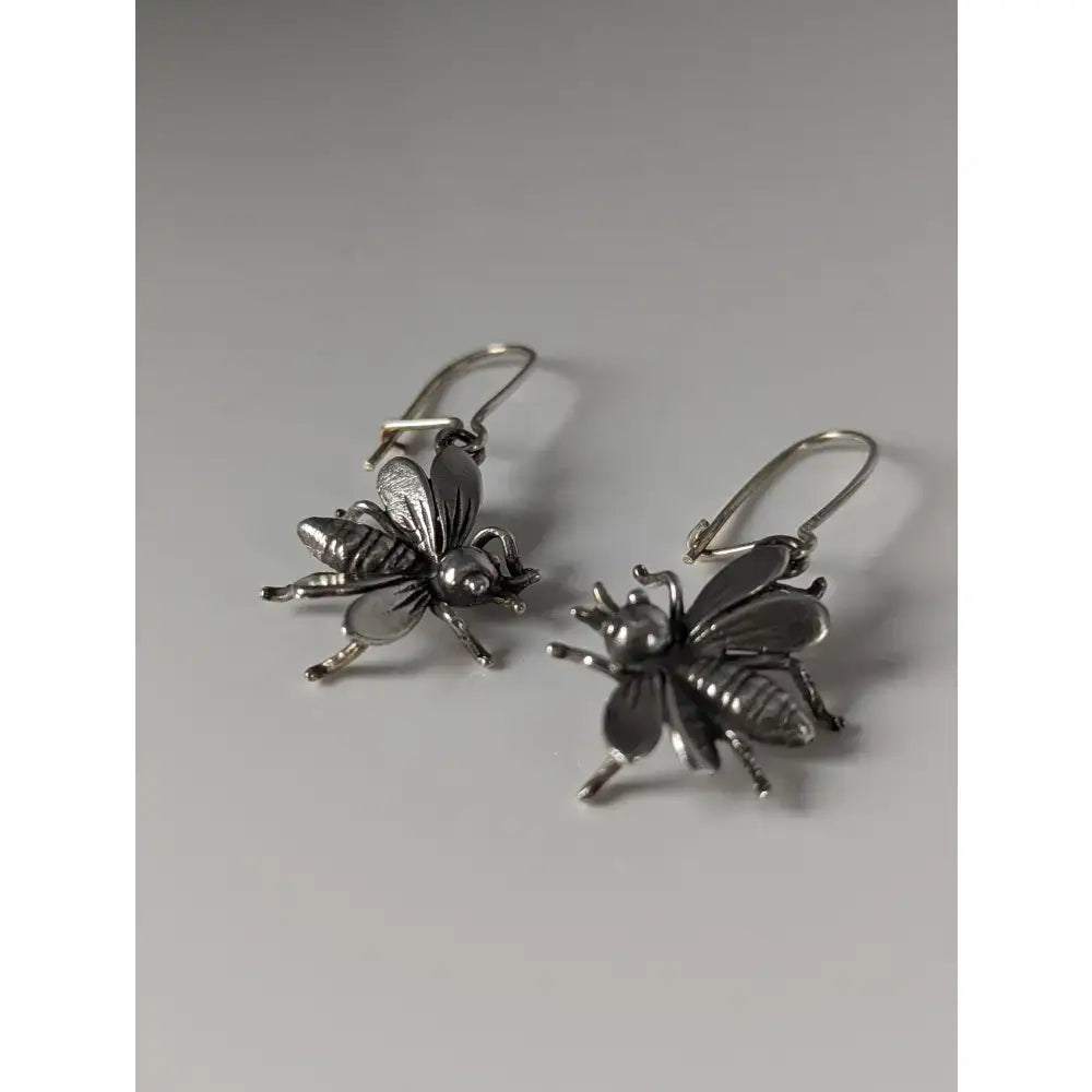 Silver steed bee dropped earrings handmade silver jewelry with detailed wings and legs perfect for equestrian jewelry lovers