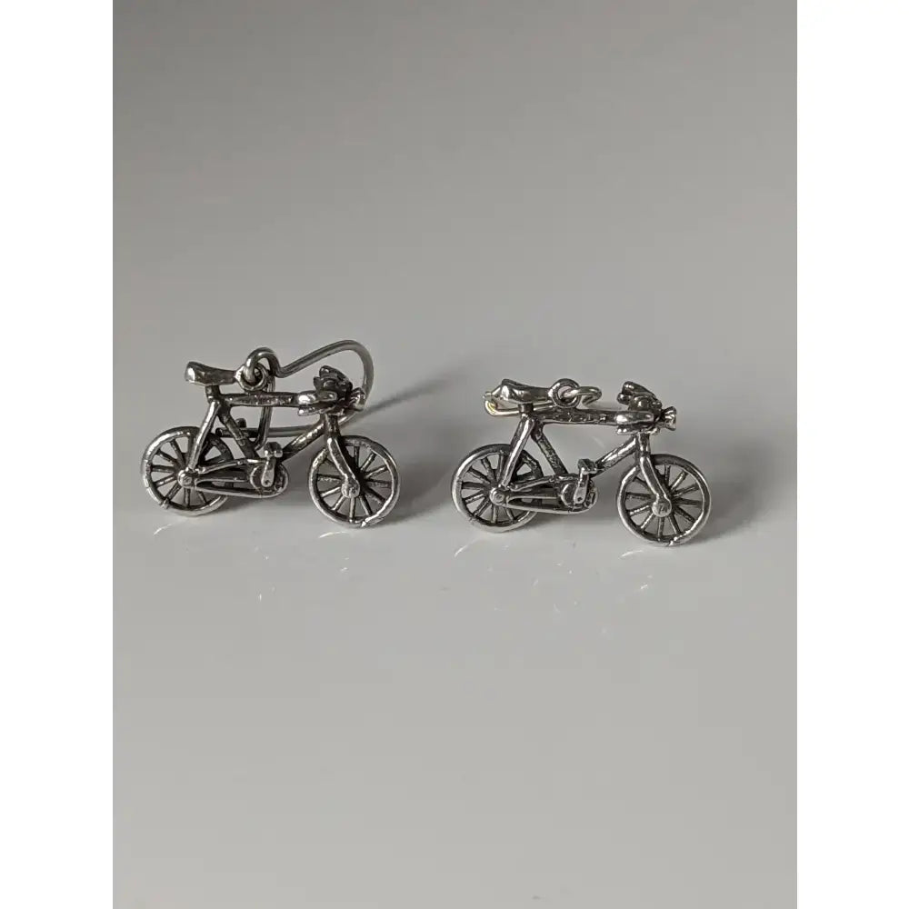 Silver steed bicycles dropped earrings handmade silver with intricate detailing and polished metallic finish