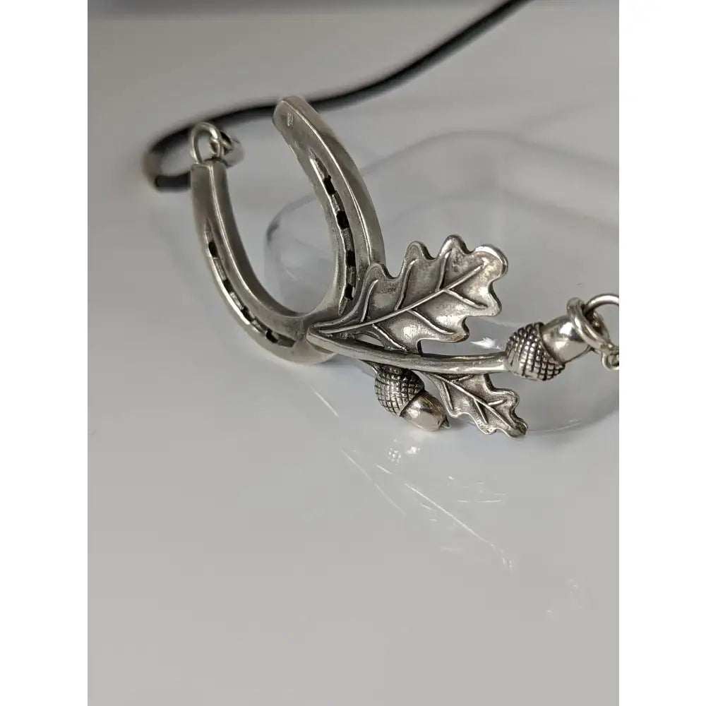 Silver steed big silver horseshoe pendant with detailed oak leaves and acorns on cord equestrian necklace