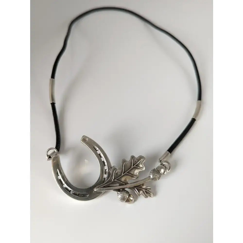 Silver steed big horseshoe equestrian necklace with silver oak leaves and acorns pendant on black cord