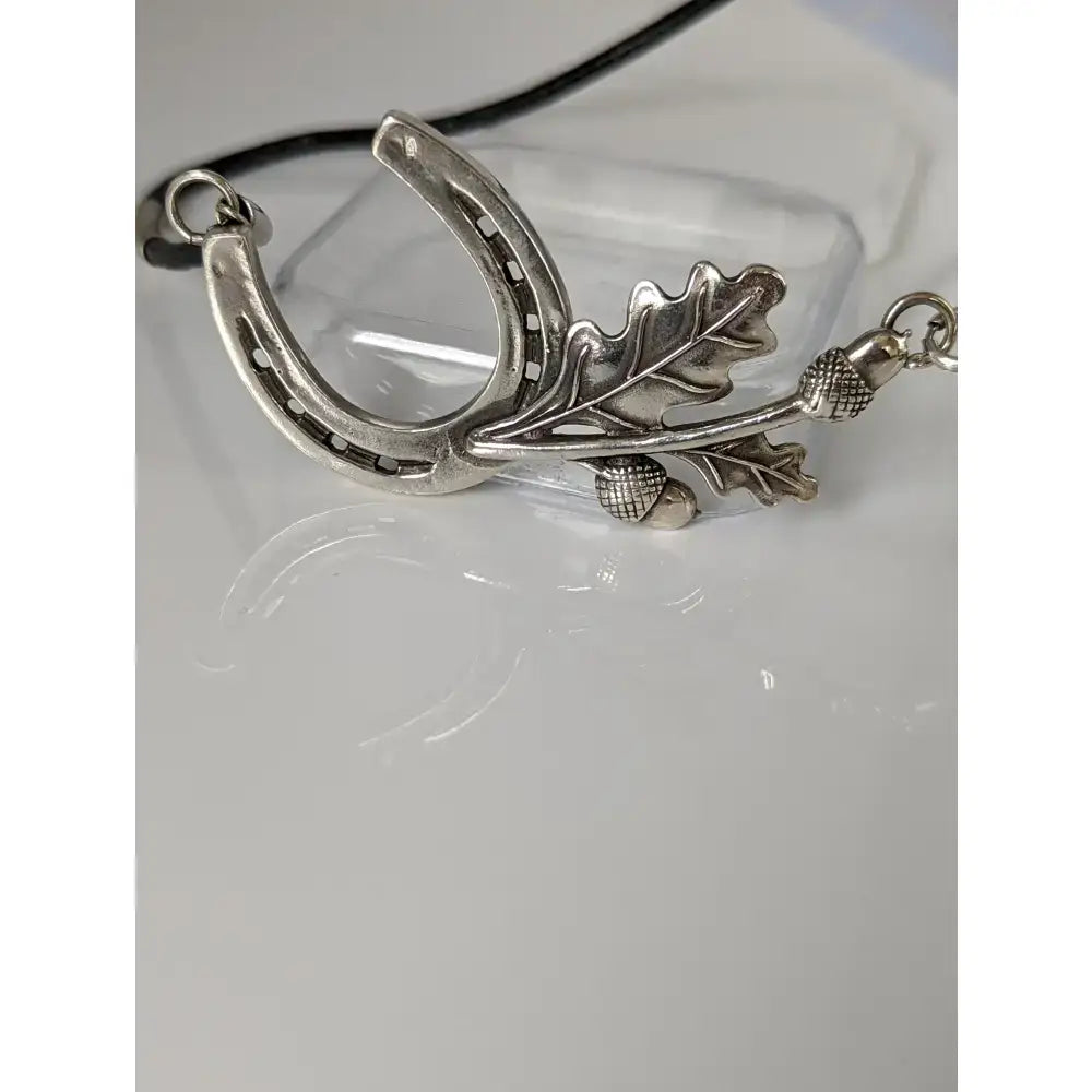 Silver steed big silver horseshoe pendant with textured oak leaves and acorns on cord equestrian necklace