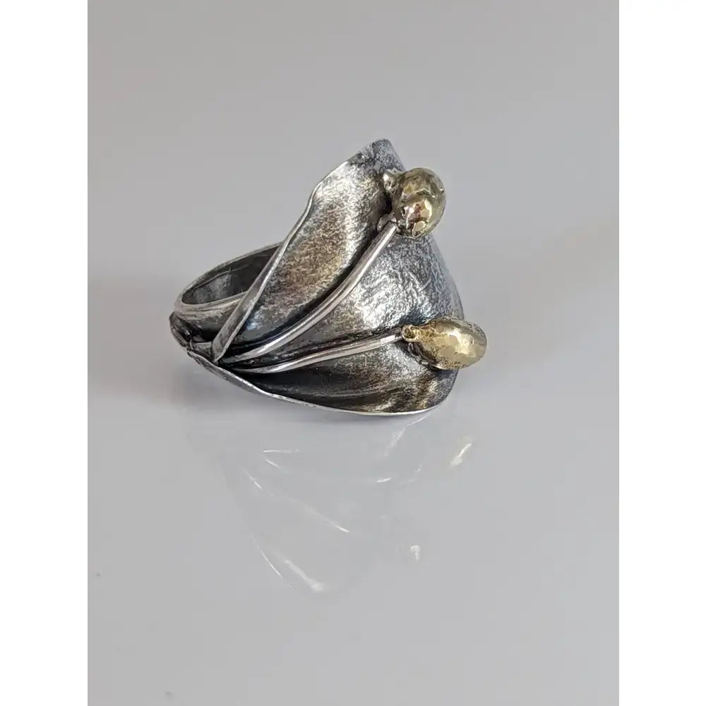 Silver steed big leaf ornament silver ring featuring hammered texture with silver and gold-toned leaf design sterling silver ring