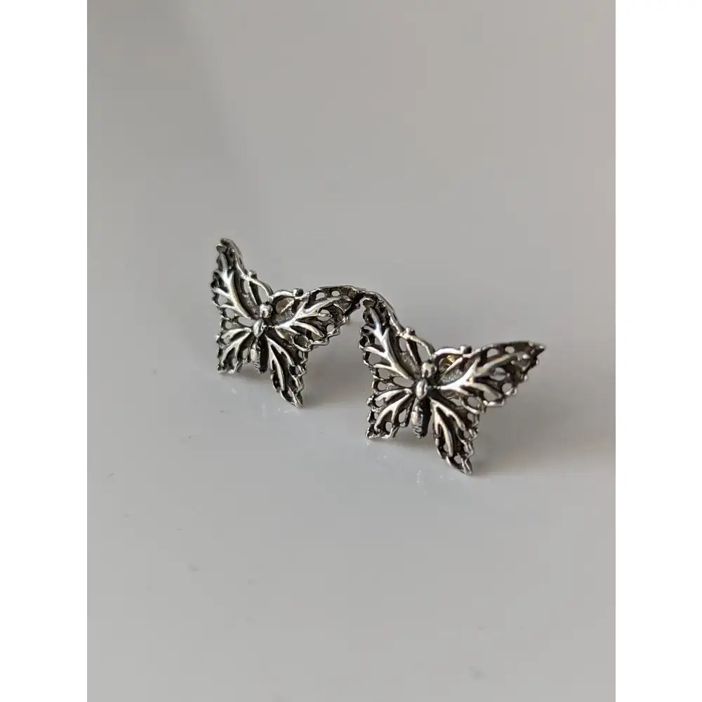 Silver steed butterfly stud earrings in silver with intricate filigree detail perfect as butterfly stud earrings