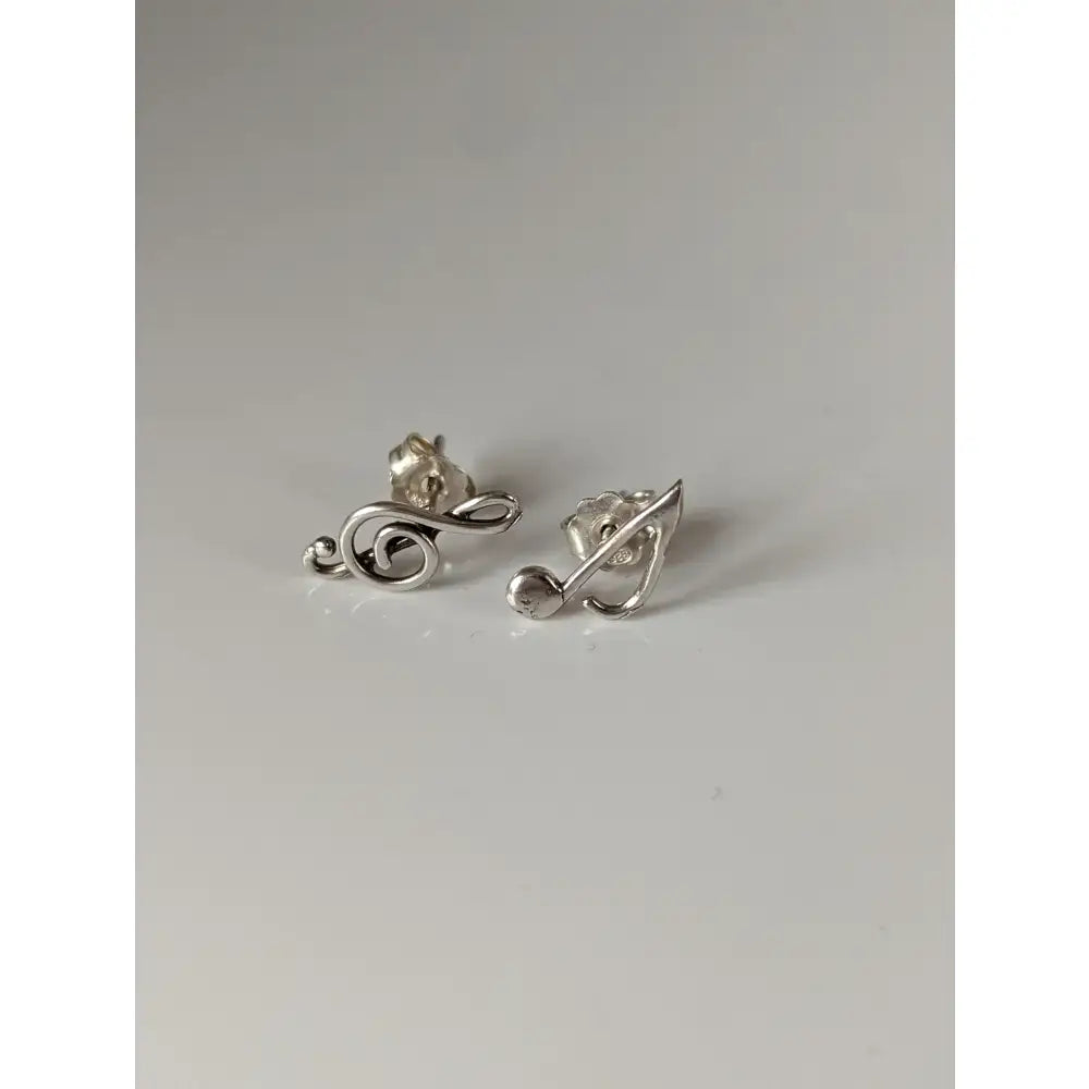 Silver steed celf note stud earrings featuring sleek minimalist silver musical note design perfect for everyday wear