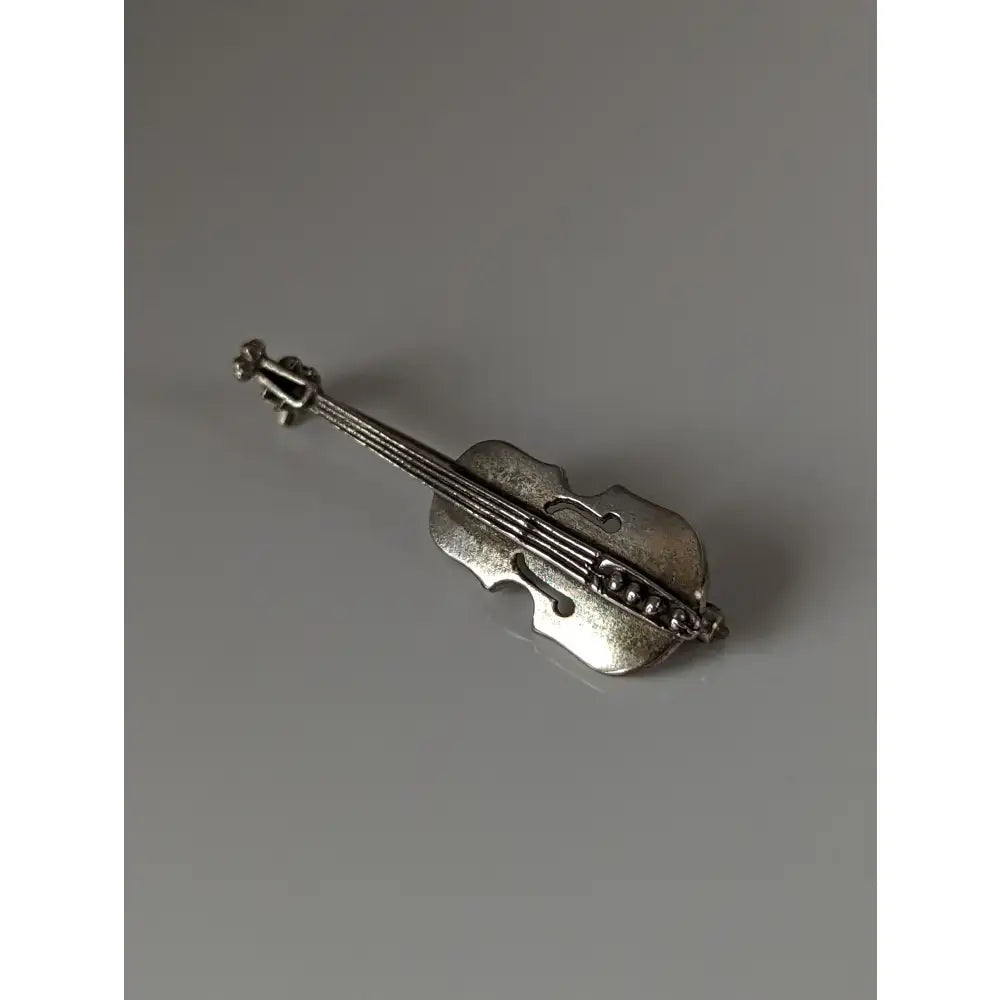 Silver steed cello silver brooch shaped like a violin with detailed craftsmanship and metallic silver finish