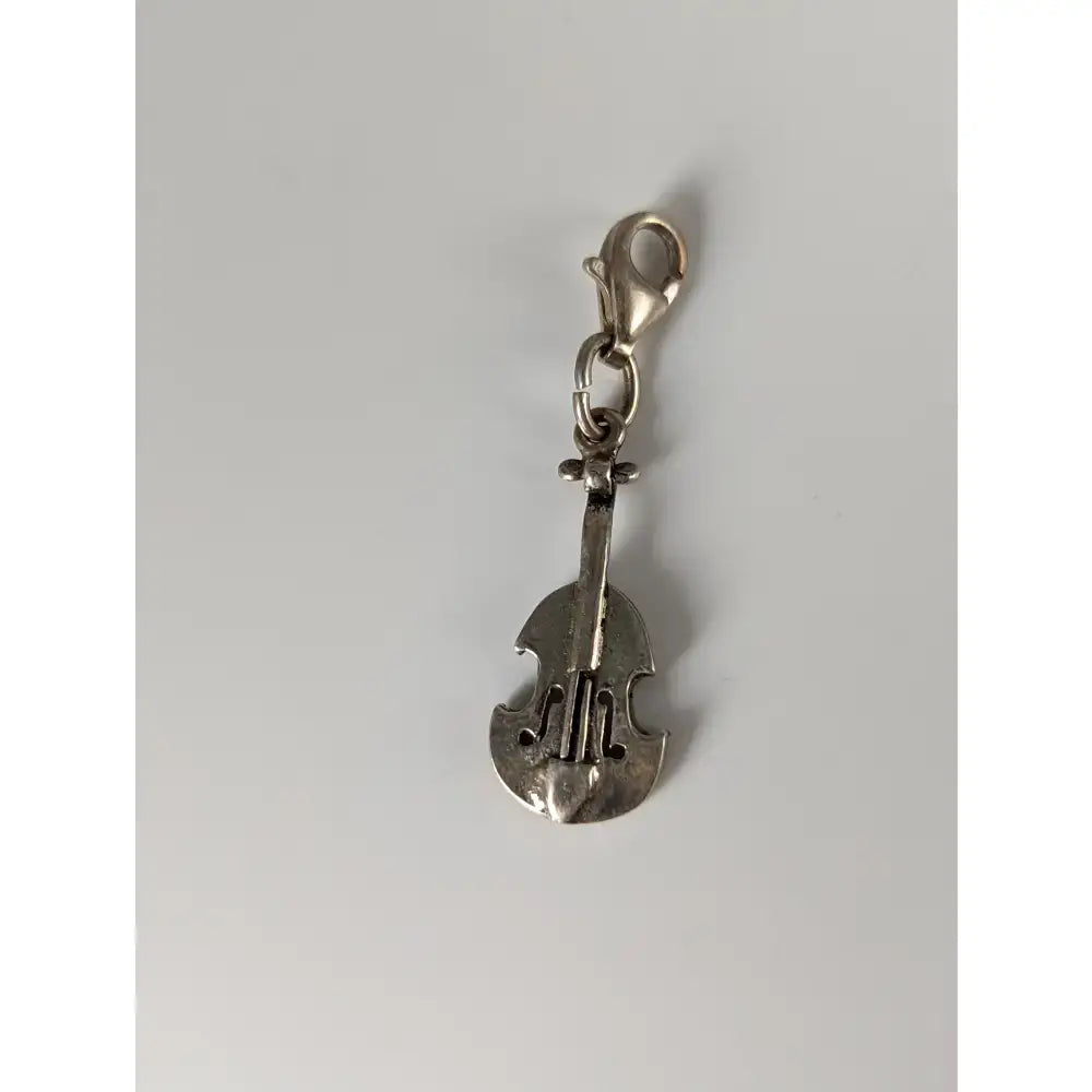 Silver steed cello silver charm in silver shaped like a violin with a clasp at the top