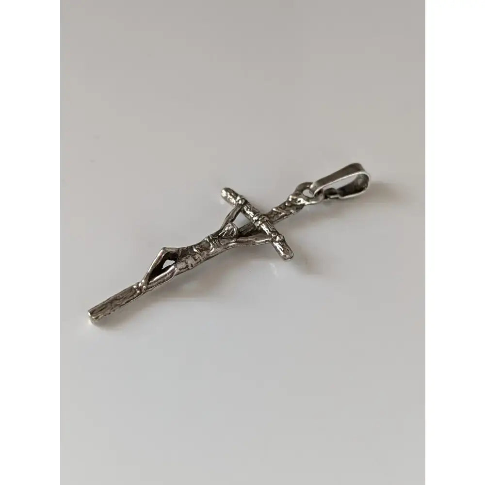 Silver steed crucifix silver pendant with detailed textured christ on the cross and polished bail for attachment