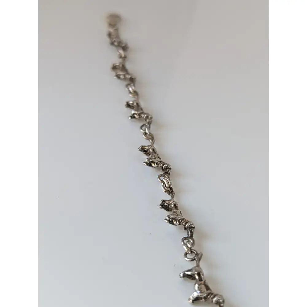 Silver steed dachshund silver bracelet with detailed three-dimensional dachshund charms linked by delicate chains