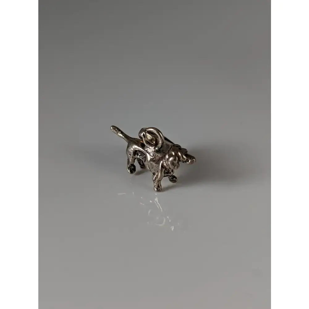 Silver steed dachshund silver pendant featuring a detailed silver-colored metal dog-shaped brooch with a loop on back