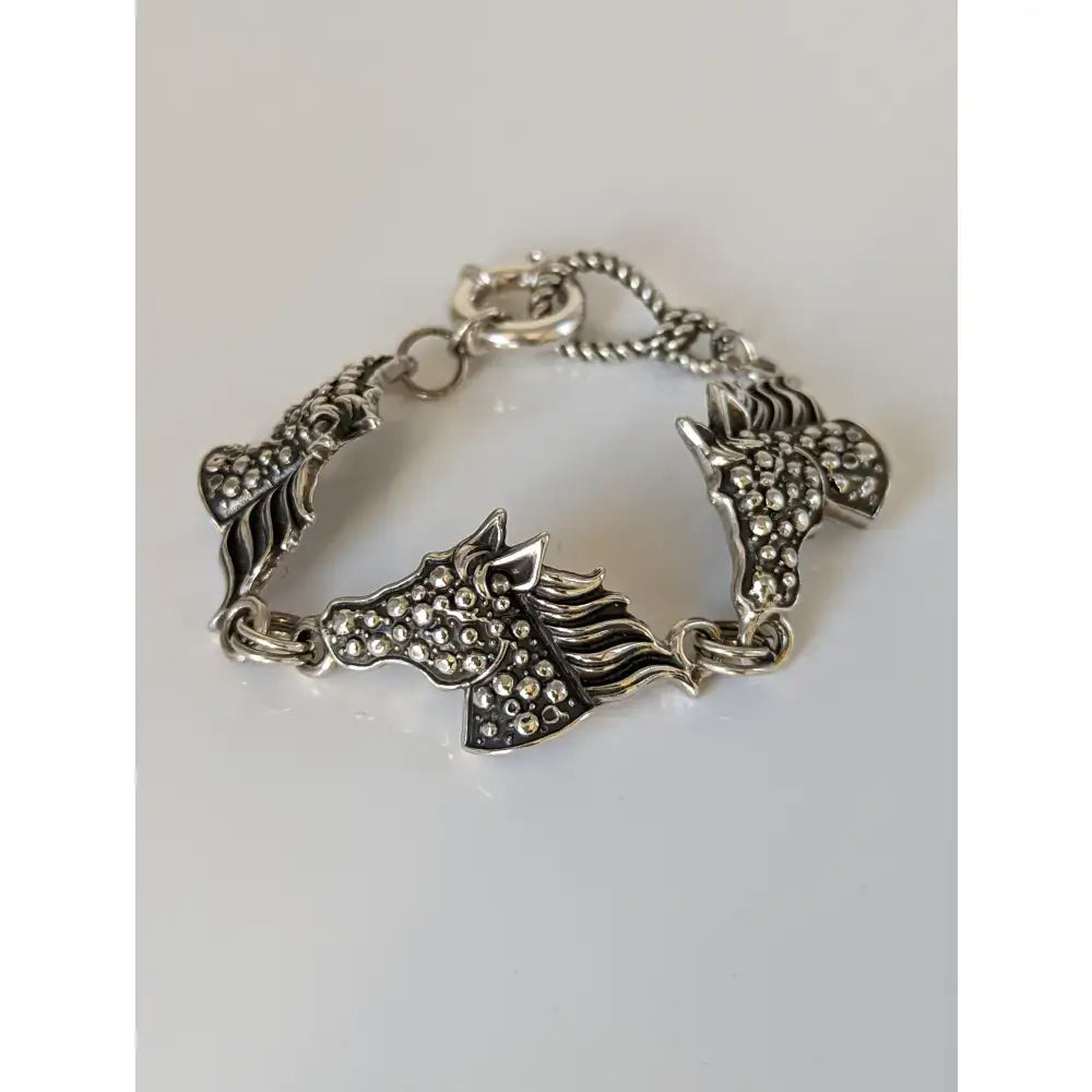 Silver steed dappled silver horse bracelet featuring rhinestones and intricate detailing in silver horse bracelet silver style