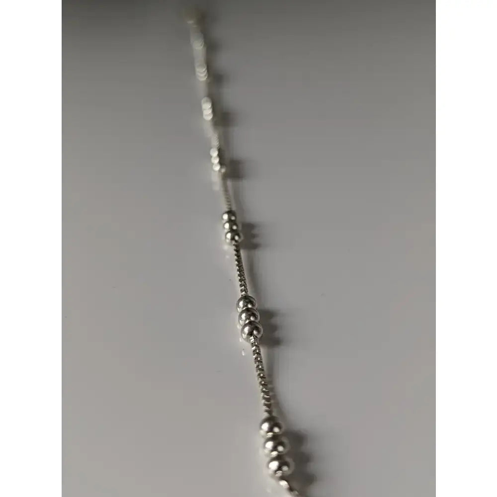 Silver steed delicate silver bracelet featuring a delicate ball silver design with a silver beaded anklet chain