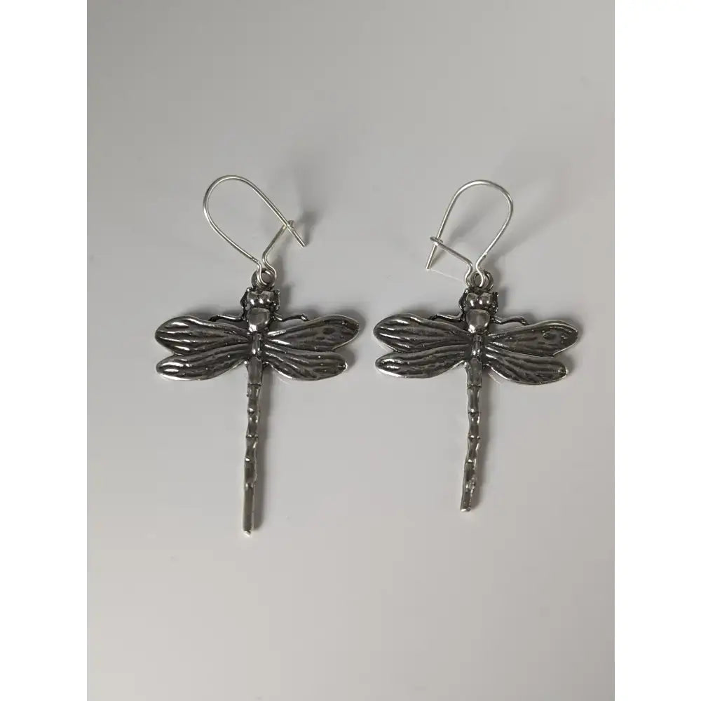 Silver steed handmade silver dragonfly dropped earrings with detailed wings and segmented bodies on classic hooks