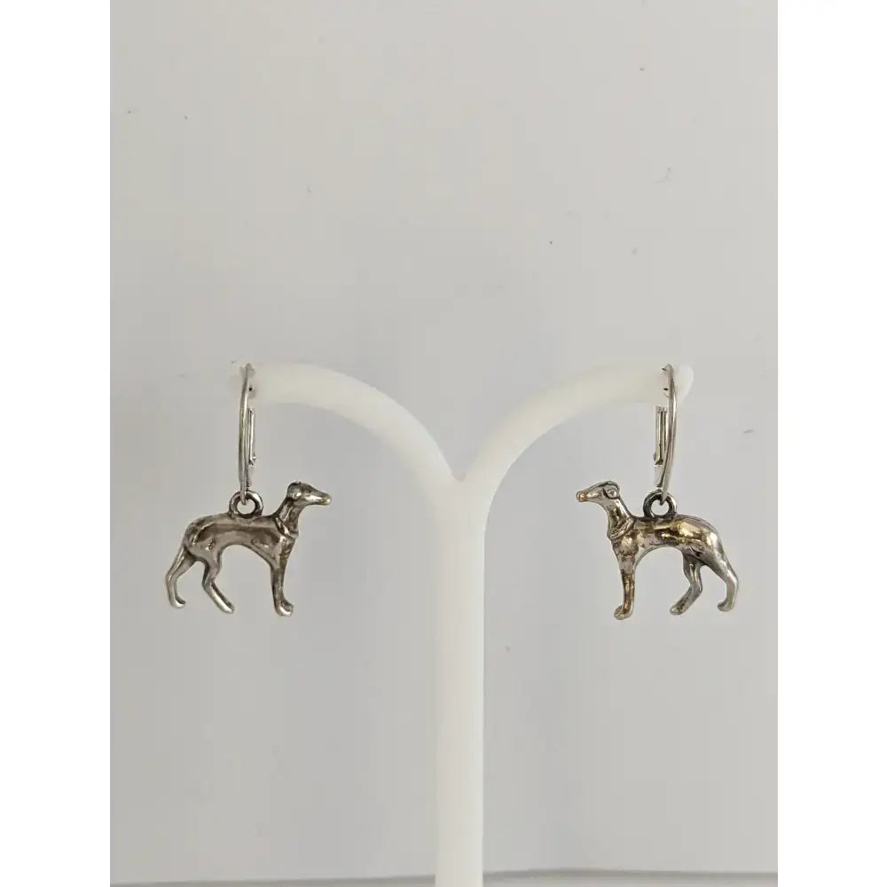 Silver steed dropped greyhound earrings featuring silver-colored dangle design with intricate details and polished finish