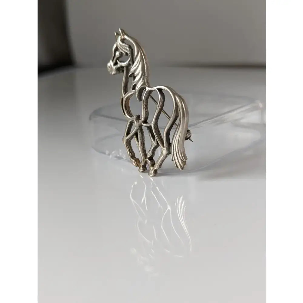 Silver steed elegant piaffe horse silver brooch with intricate wirework detailing perfect as a horse silver brooch