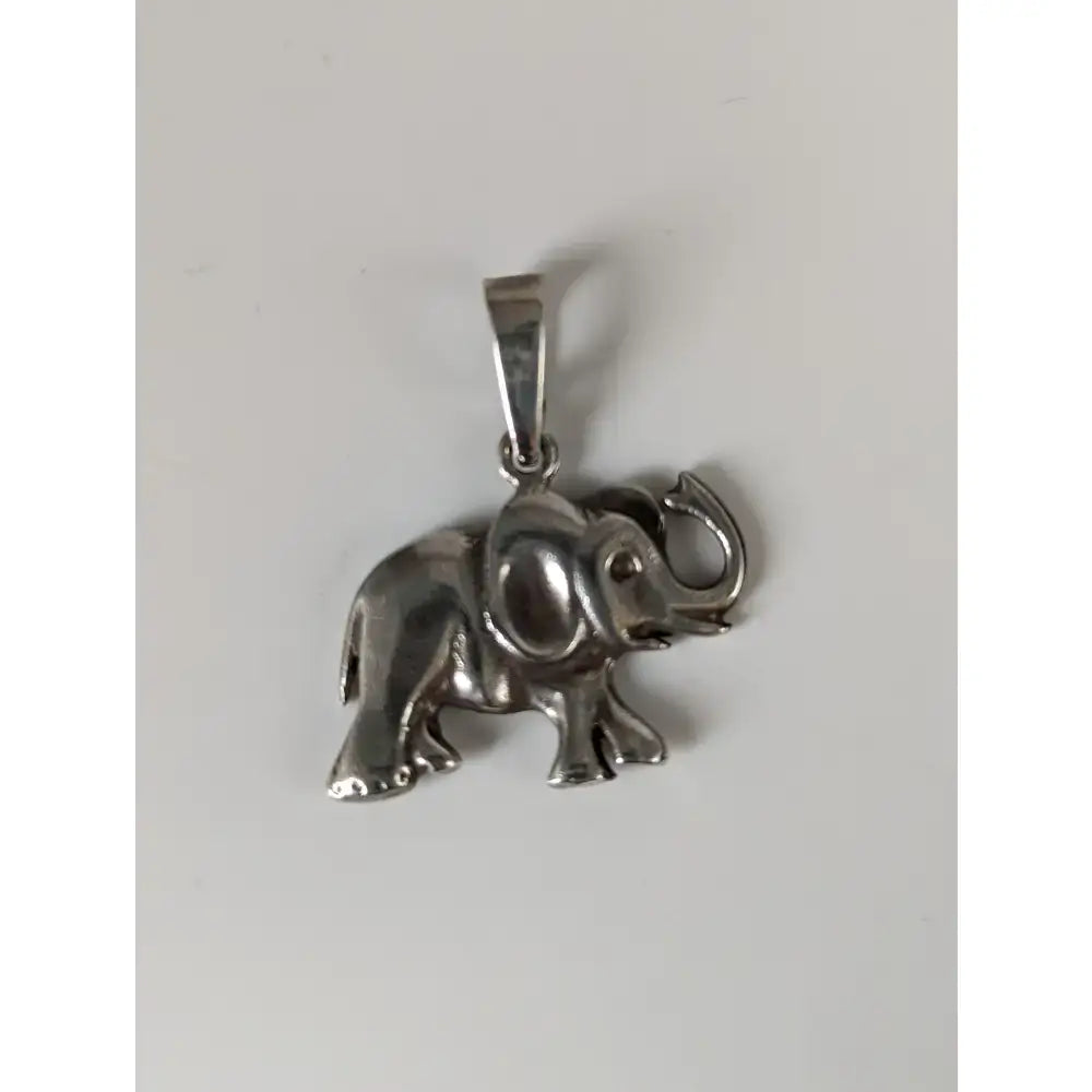 Silver steed elephant silver pendant with polished metallic finish and detailed sculpted features in silver