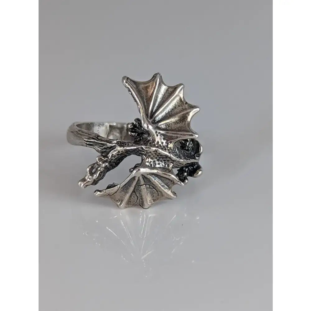 Silver steed fantasy dragon ring in sterling silver with detailed wings and textured scales for a bold look