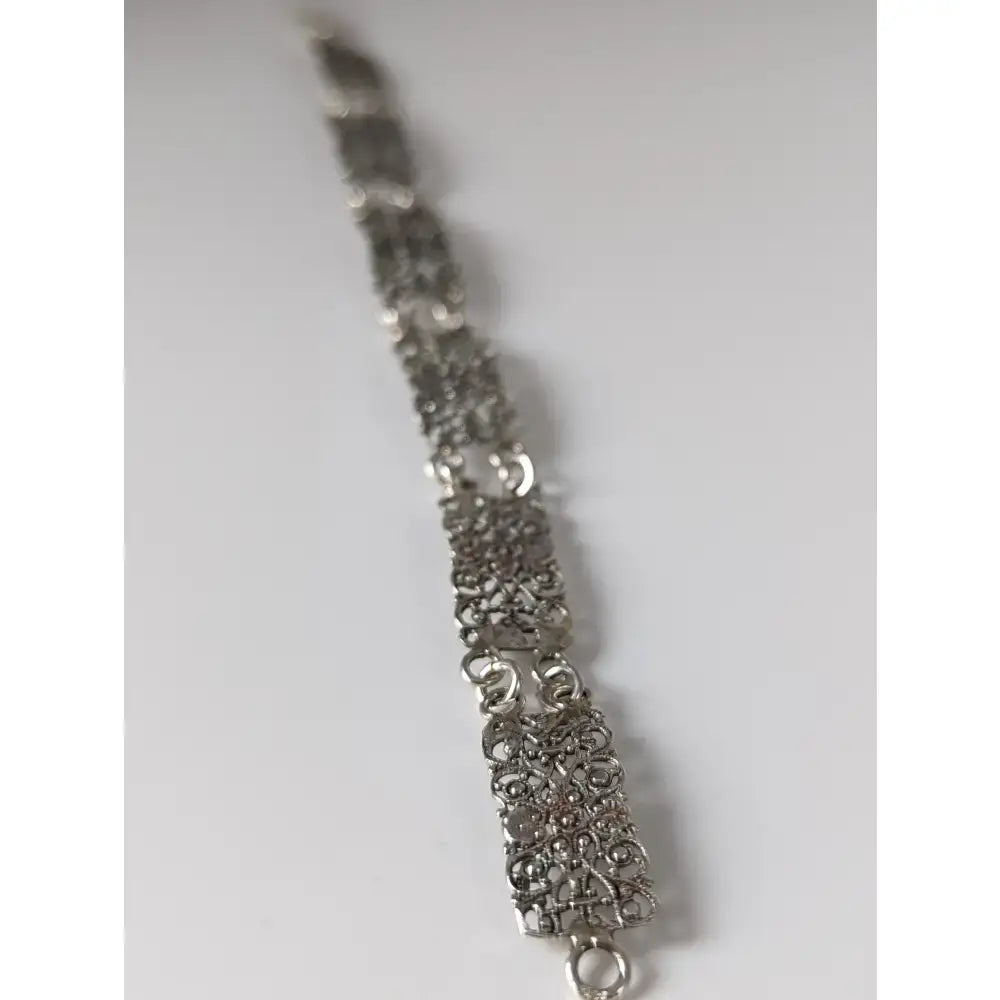 Silver steed filigree vintage silver bracelet with intricate ornate patterns in classic filigree vintage silver design