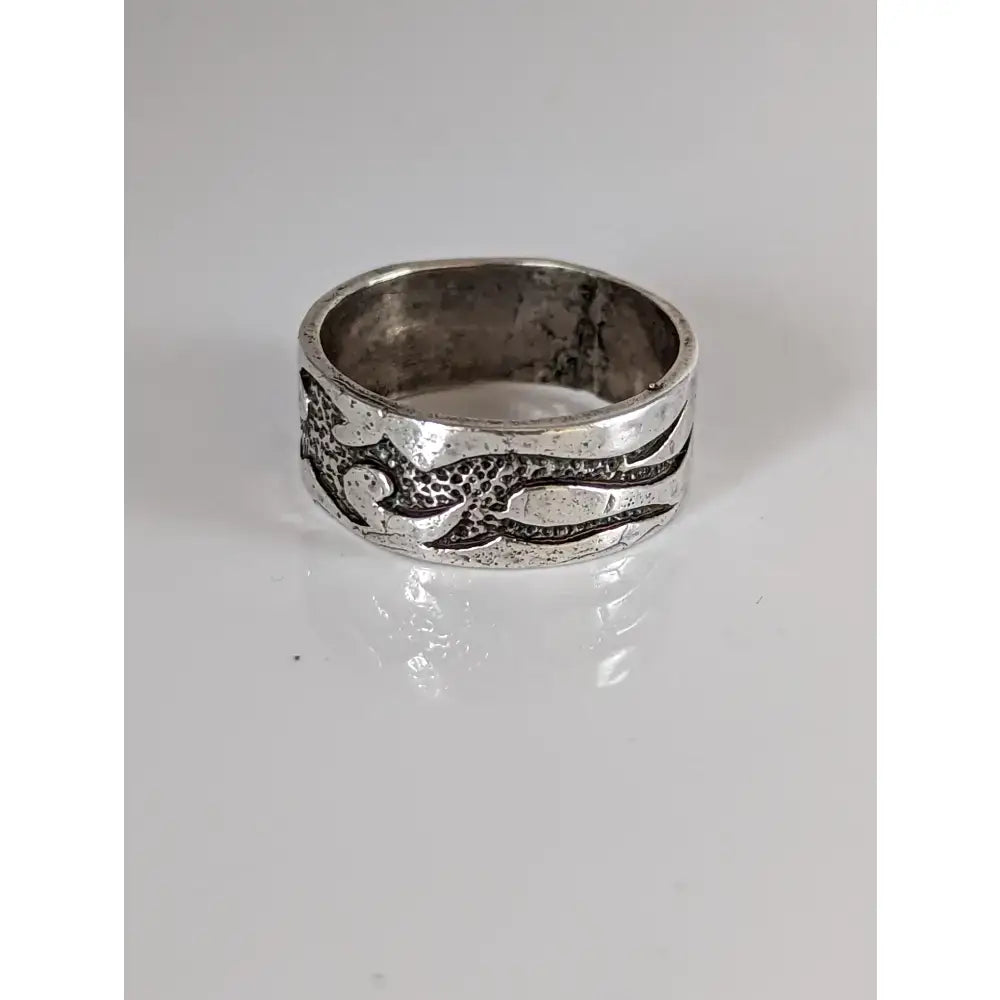 Silver steed flames ring featuring a textured silver band with a stylized animal motif perfect for equestrian jewelry fans