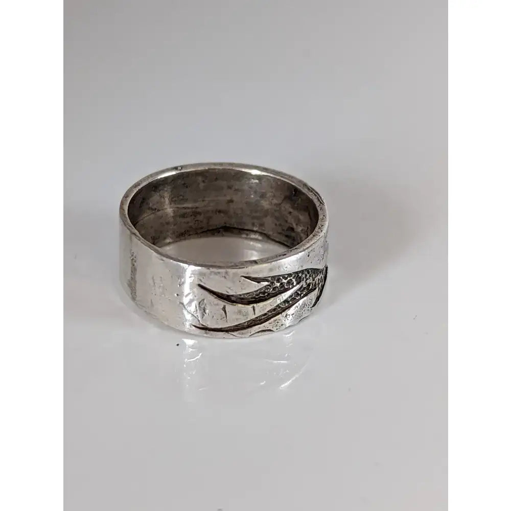 Textured silver steed flames ring with hammered finish and engraved feather design perfect for equestrian jewelry fans