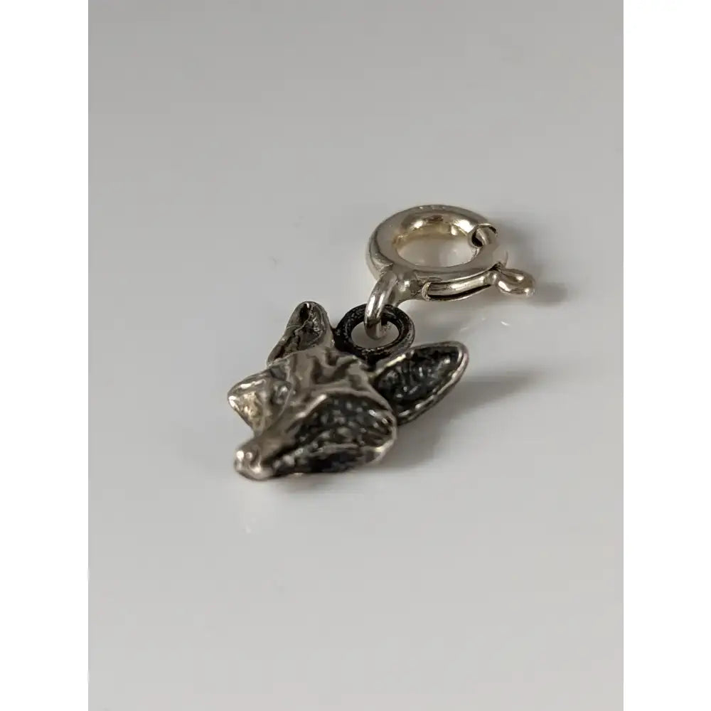 Silver steed fox head silver charm with detailed textured fur and matching clasp perfect for equestrian jewelry