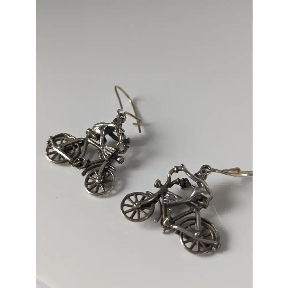Silver steed frogs bikes dropped earrings in sterling silver with detailed rider and bike designs