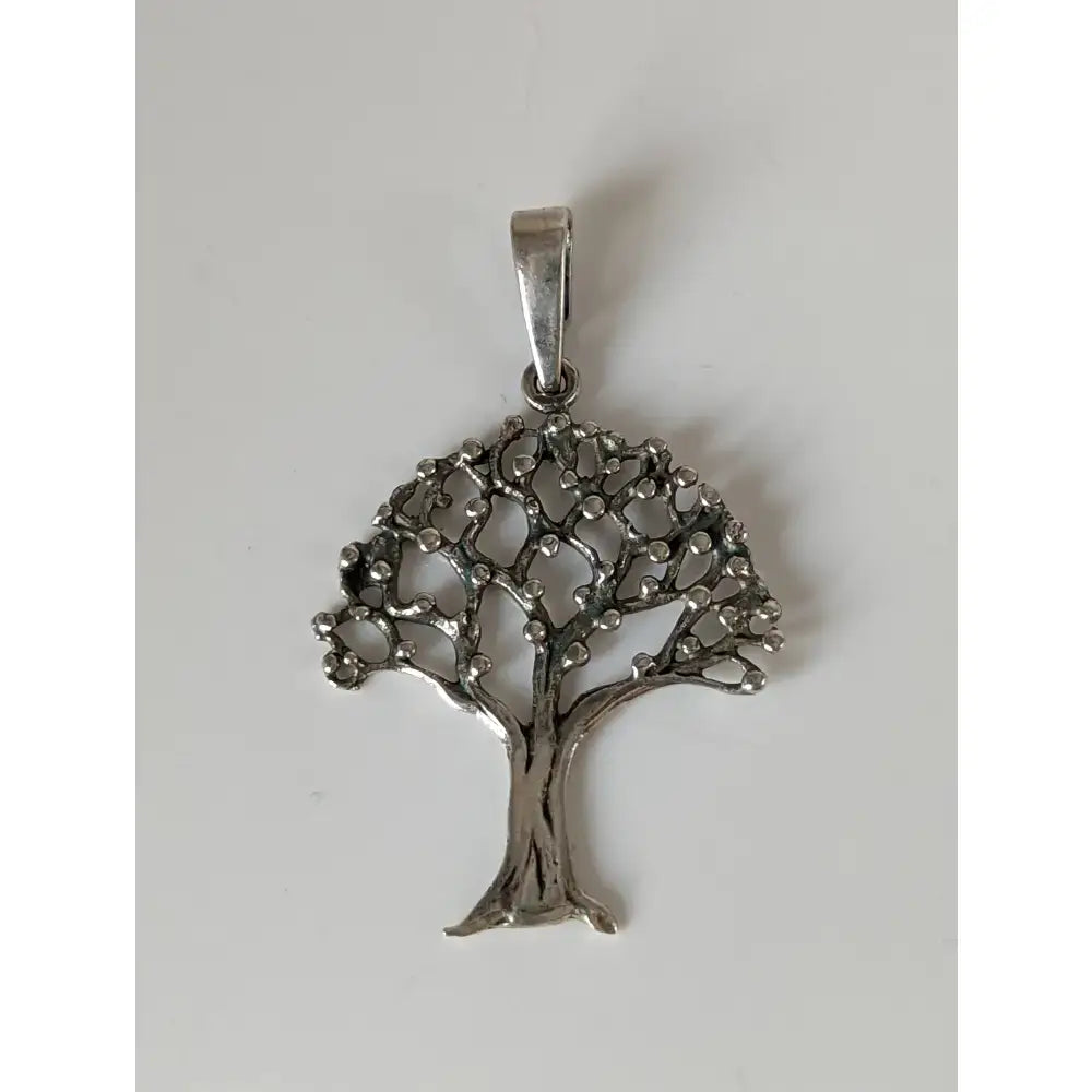 Silver steed fruit tree silver pendant featuring a sterling silver tree silver pendant with intricate filigree and bead accents