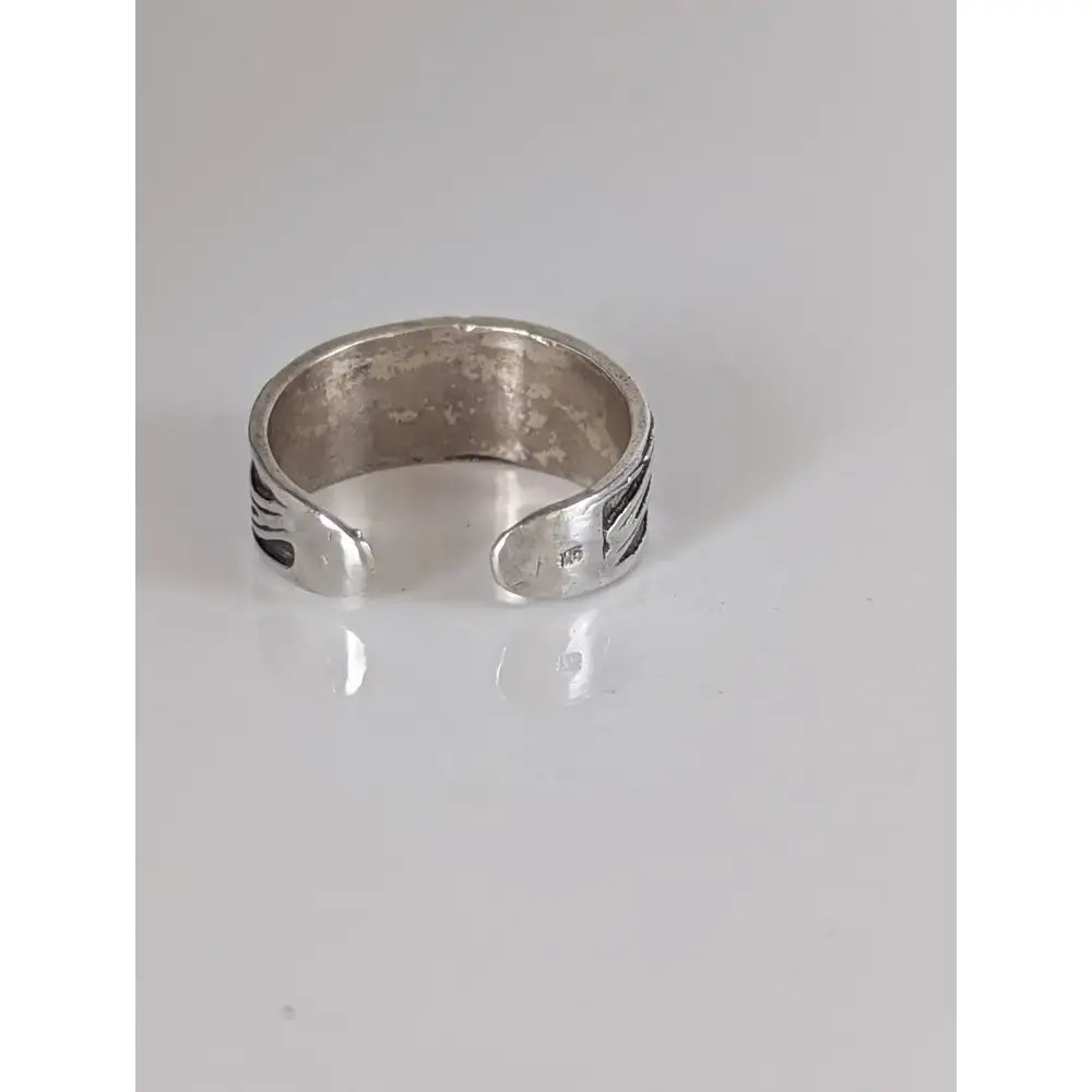 Silver steed galaxy adjustable silver band open-ended ring with engraved wing-like patterns on outer surface