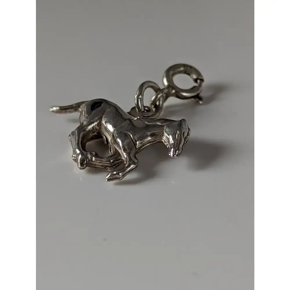 Silver steed galloping horse silver charm with detailed sculpted features and small loop for easy attachment