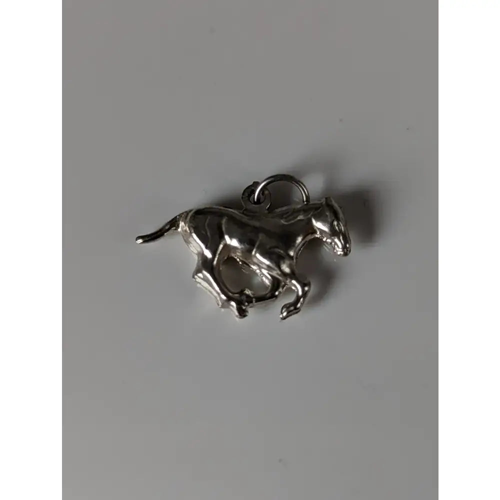 Silver steed galloping horse silver pendant in silver with polished finish and detailed sculpted form charm