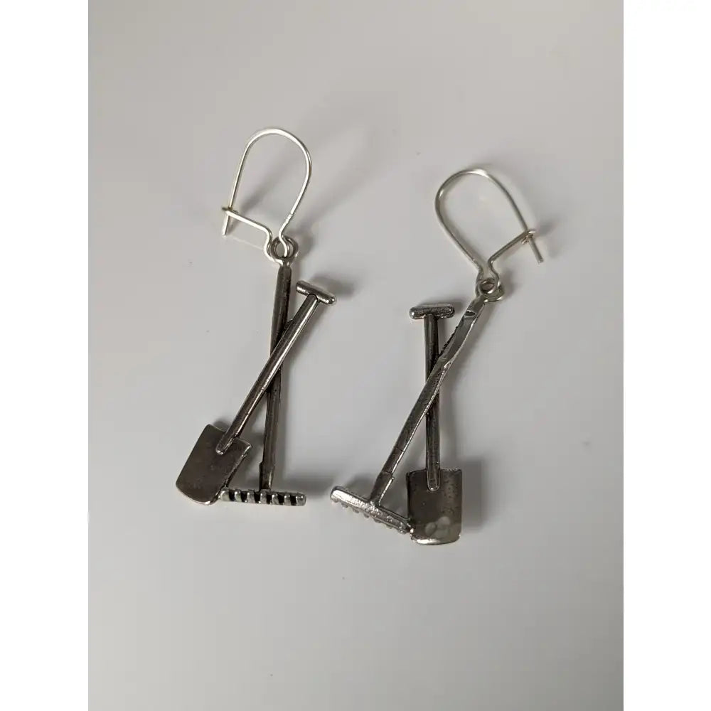 Silver steed gardening tools dropped earrings in silver-toned metal with minimalist shovel and rake design