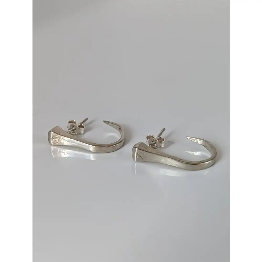 Silver steed hoofnail stud earrings silver hoop with hammered texture and subtle engraved details