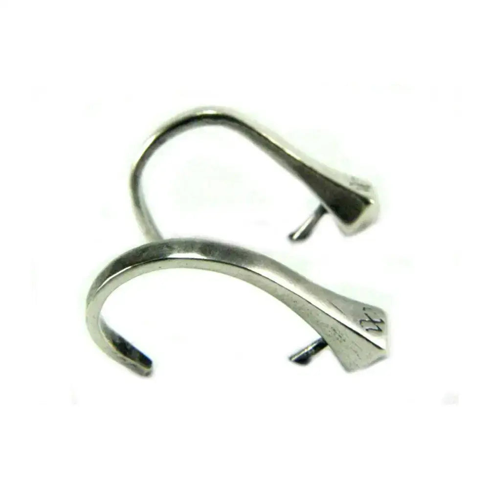 Silver steed hoofnail stud earrings made of silver-toned metal with sleek curved design and small clasp mechanism