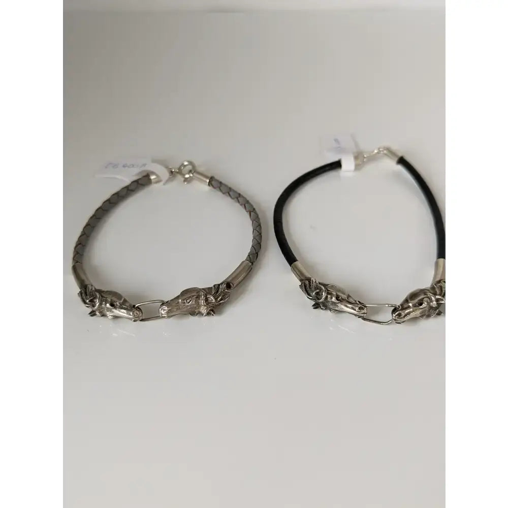 Silver steed horse head link bracelet with silver charm on braided and black leather cord bands