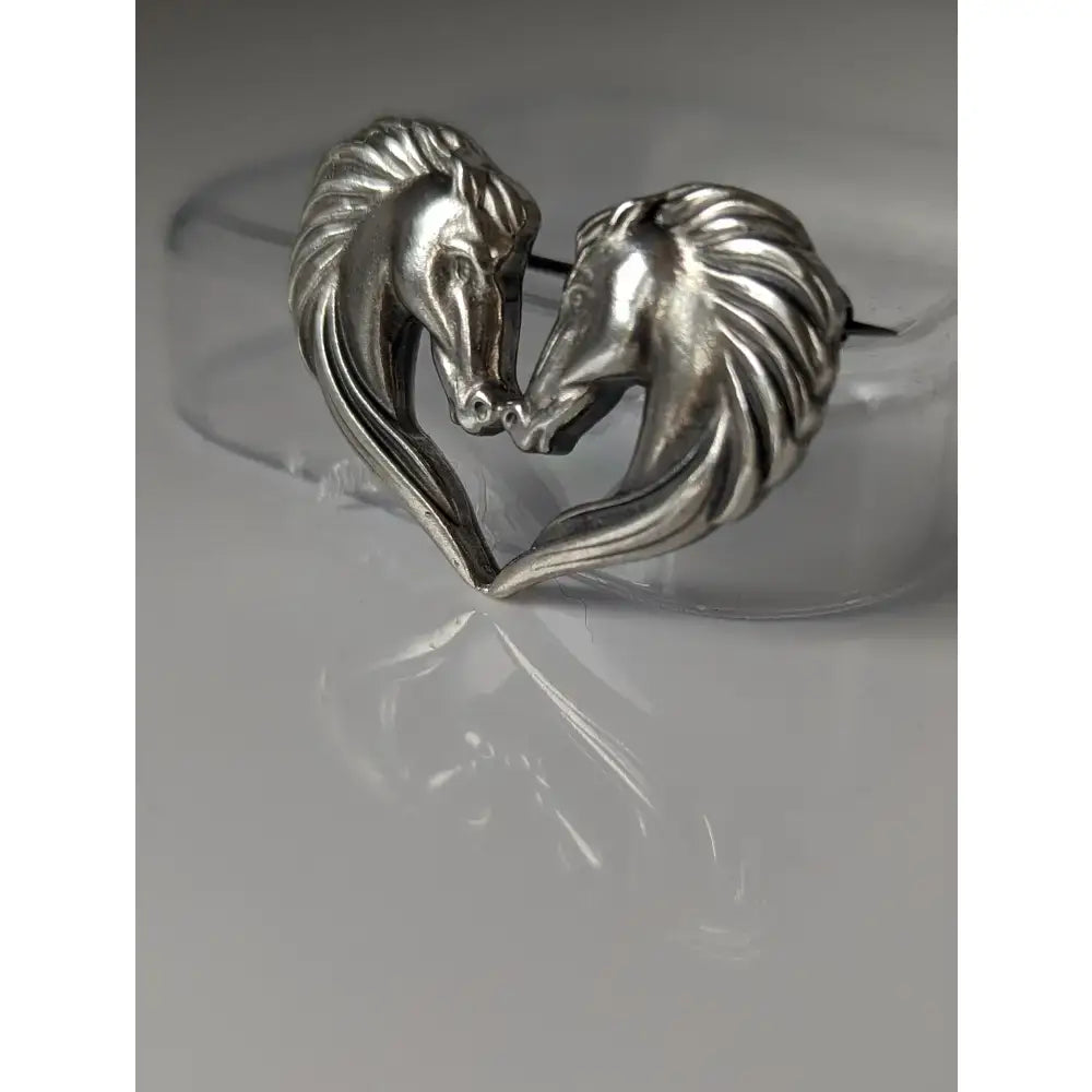 Silver steed horse heart brooch in silver tone with two detailed horse heads perfect as an equestrian stock tie pin