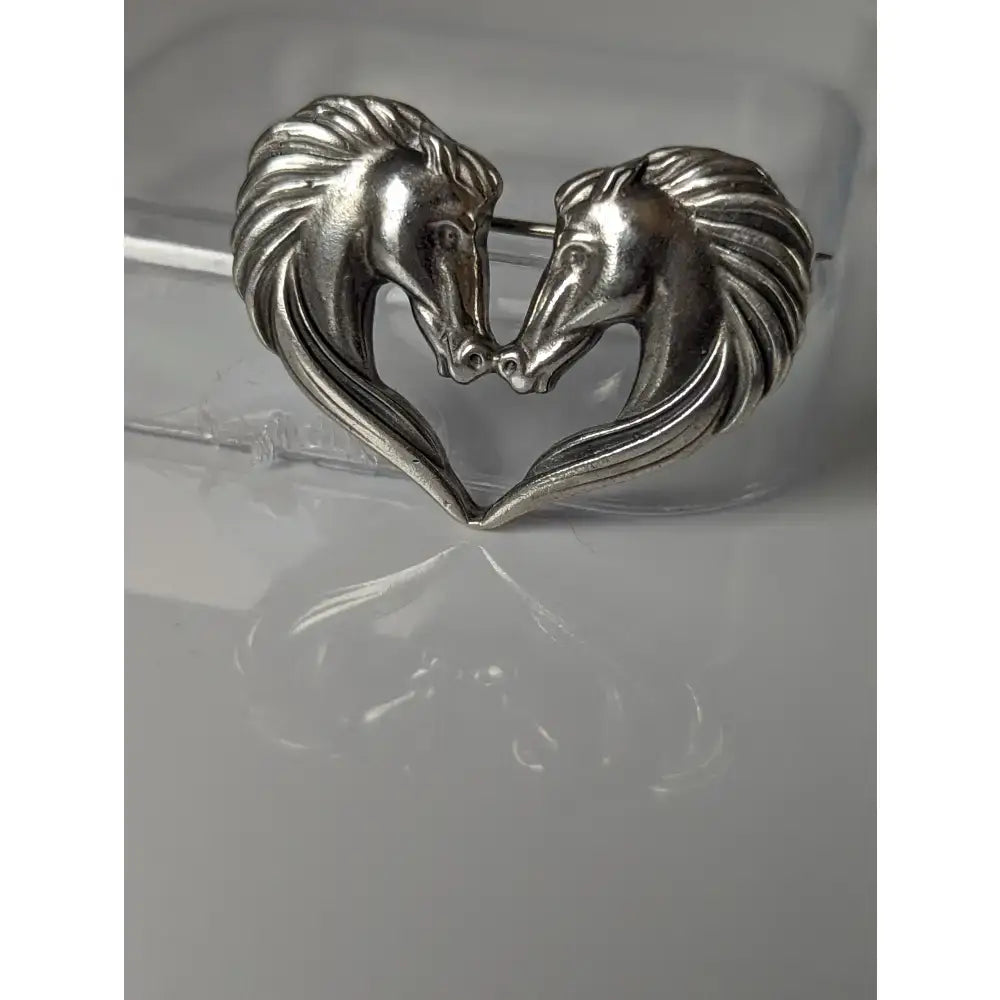 Silver steed horse heart brooch stock tie pin with two detailed horse heads forming a heart shape in silver
