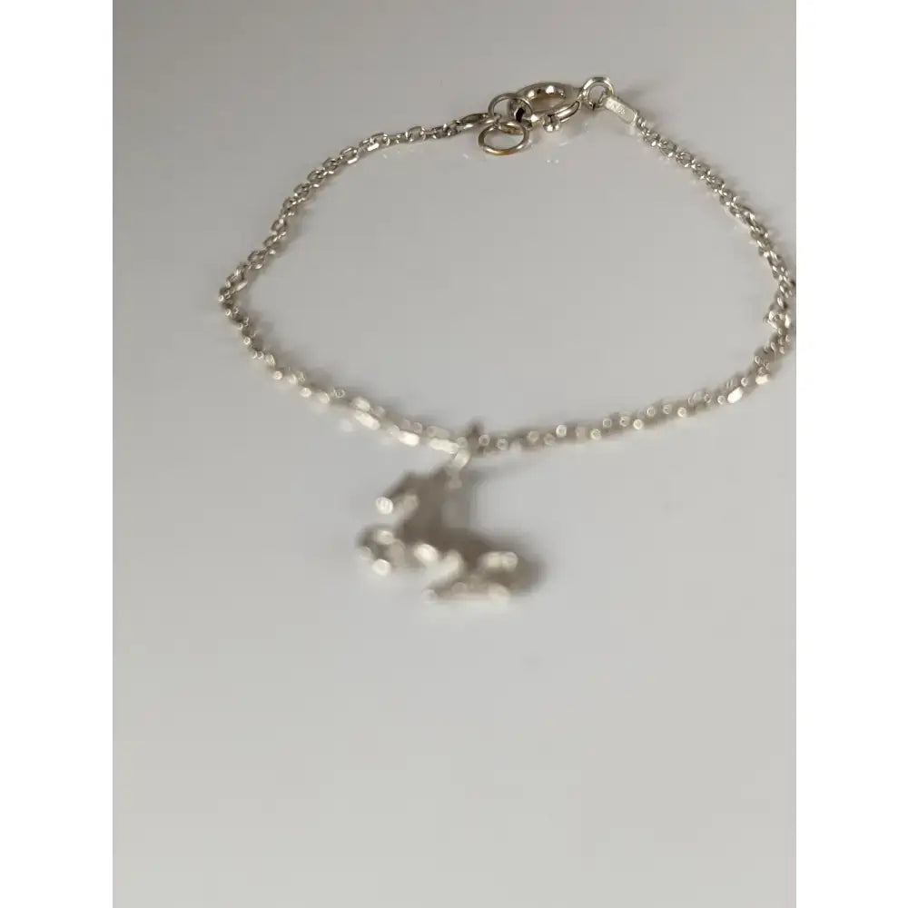 Silver steed chain delicate bracelet with a sterling silver detailed horse charm on a fine chain