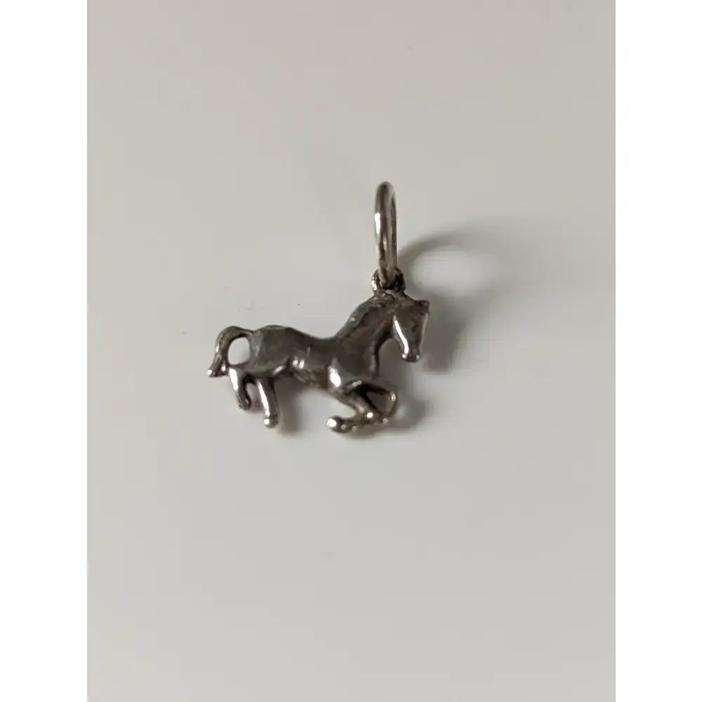 Silver steed horse silver pendant with polished metallic finish and detailed sculpted features, perfect equestrian jewelry