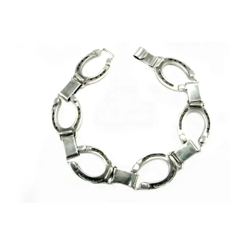 Silver steed horseshoe bracelet with polished silver link chain and interlocking horseshoe charms in equestrian jewelry style