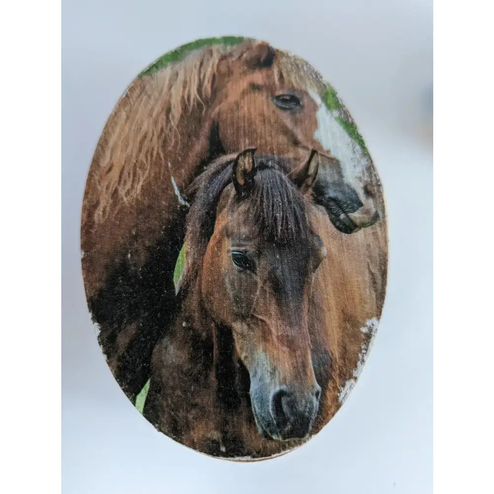 Oval wooden plaque from silver steed jewellery features detailed horses for unique jewellery oval boxes display