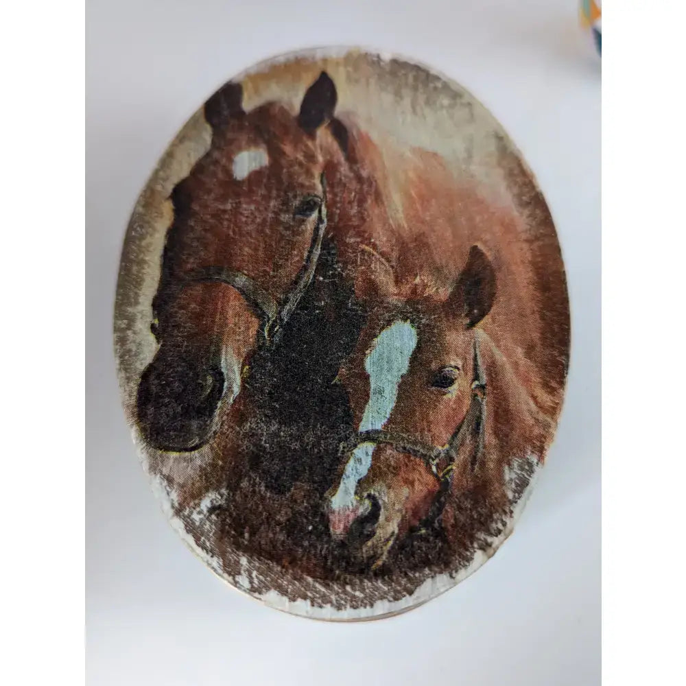 Oval decorative wall plaque from silver steed jewellery featuring textured brown horses, perfect for jewellery oval boxes
