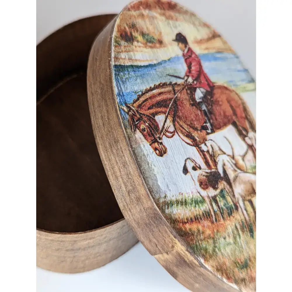 Wooden oval box from silver steed jewellery featuring a painted rider in red jacket with hounds, perfect jewellery oval box