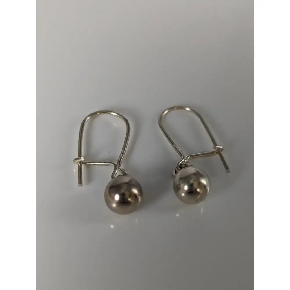 Silver steed large silver balls dropped earrings with simple hook clasps in equestrian style