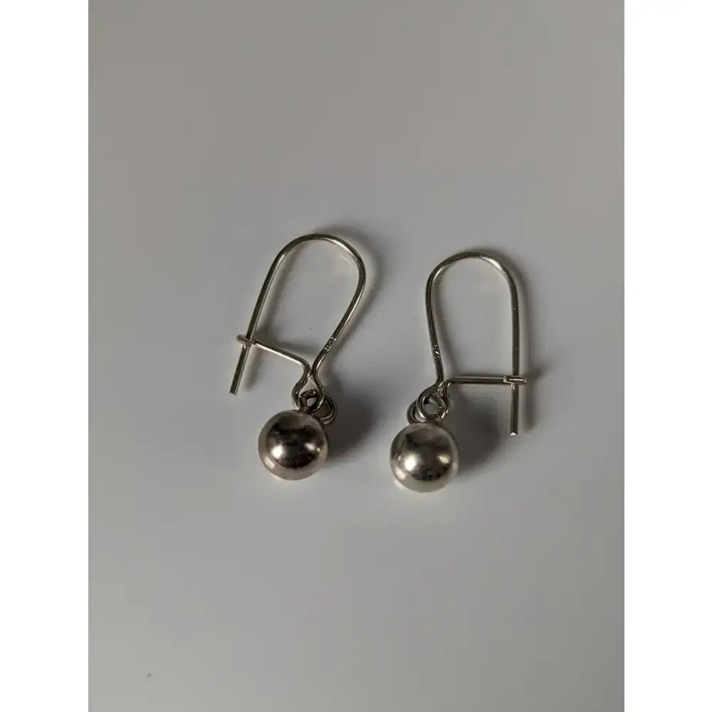 Silver steed large silver ball drop earrings with simple hook clasps in a sleek equestrian style design