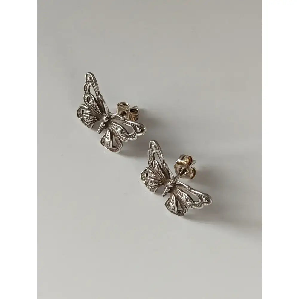 Silver steed large butterfly stud earrings with intricate filigree detailing in vintage-inspired silver design