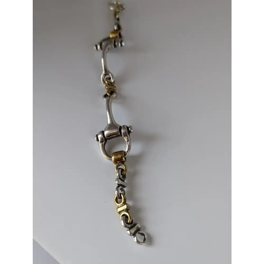 Silver steed large two tone silver french link snaffle bracelet with a silver and gold toned horsebit chain design