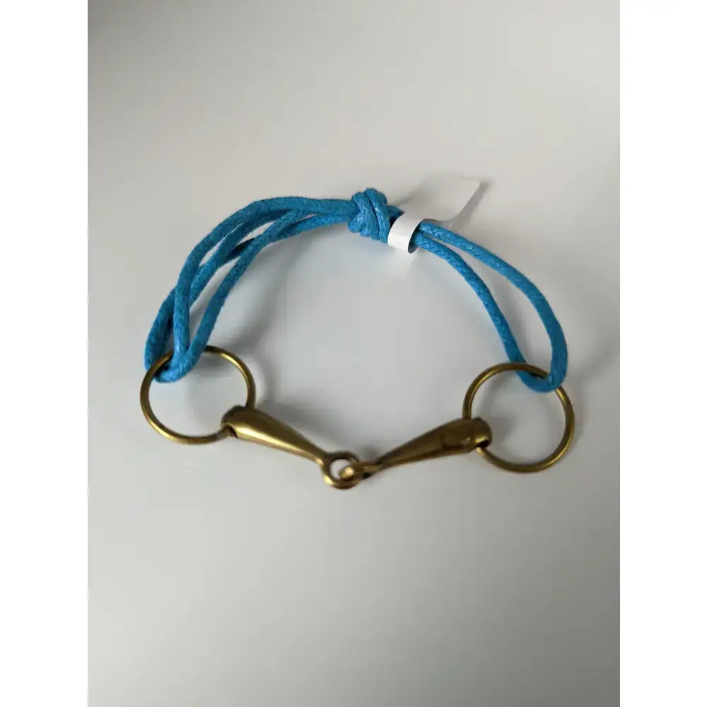Silver steed leather turquoise braided snaffle cord bracelet with a brass snaffle leather horsebit buckle