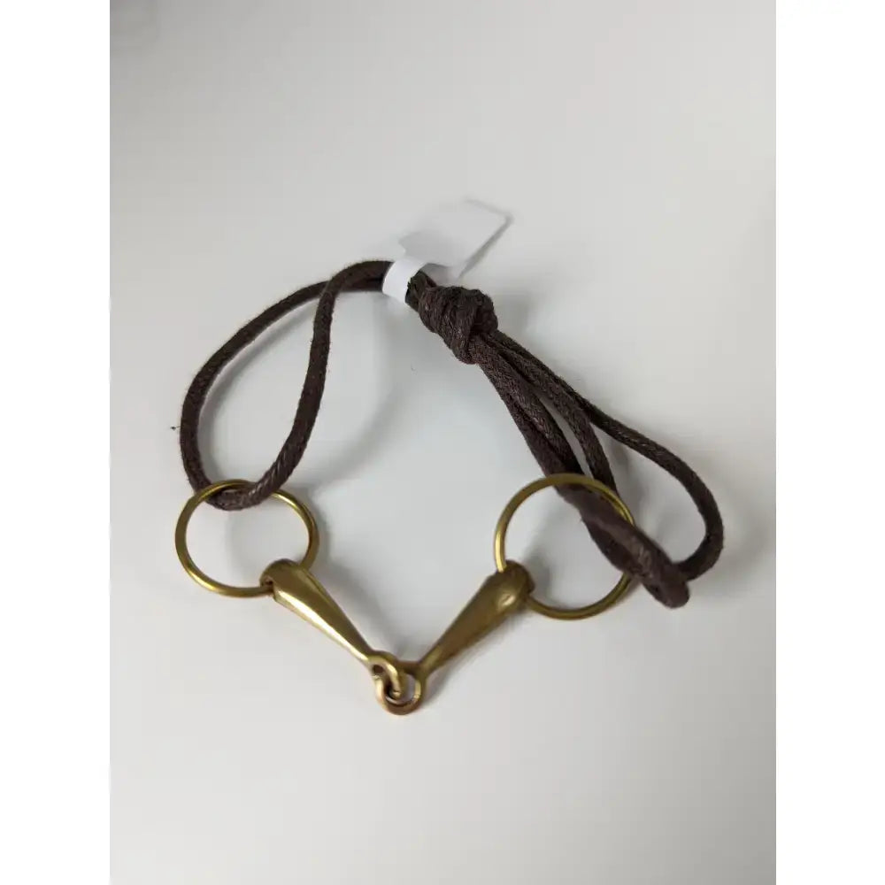 Brown leather snaffle cord bracelet with brass horsebit design from silver steed leather collection