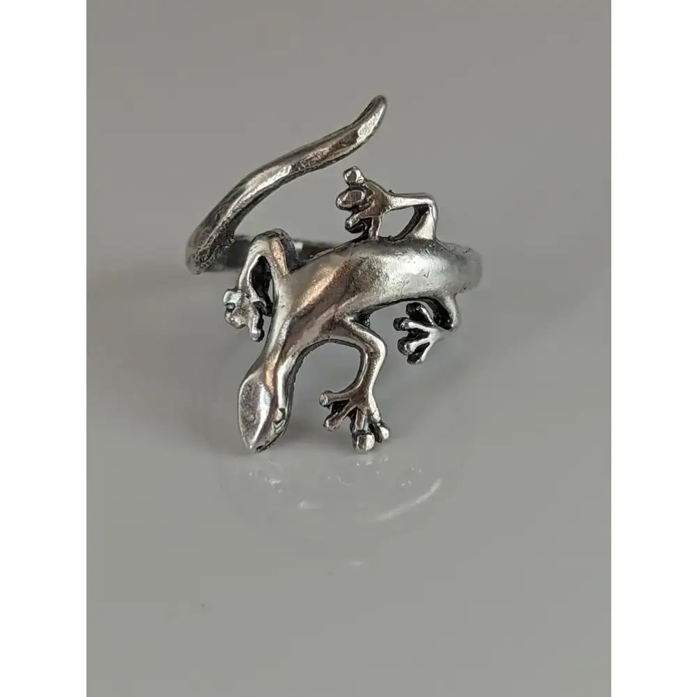 Silver steed lizard ring featuring a handcrafted silver design with detailed sculpted limbs and textured surface